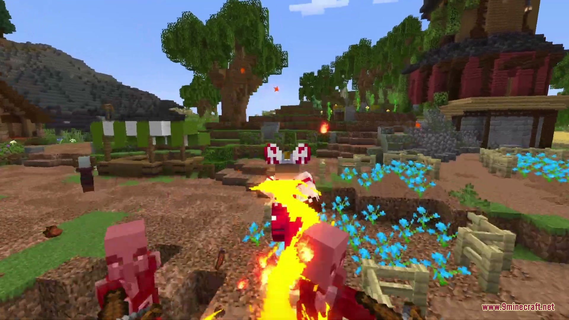 A player character uses powerful fire attacks to defeat hostile pillager mobs