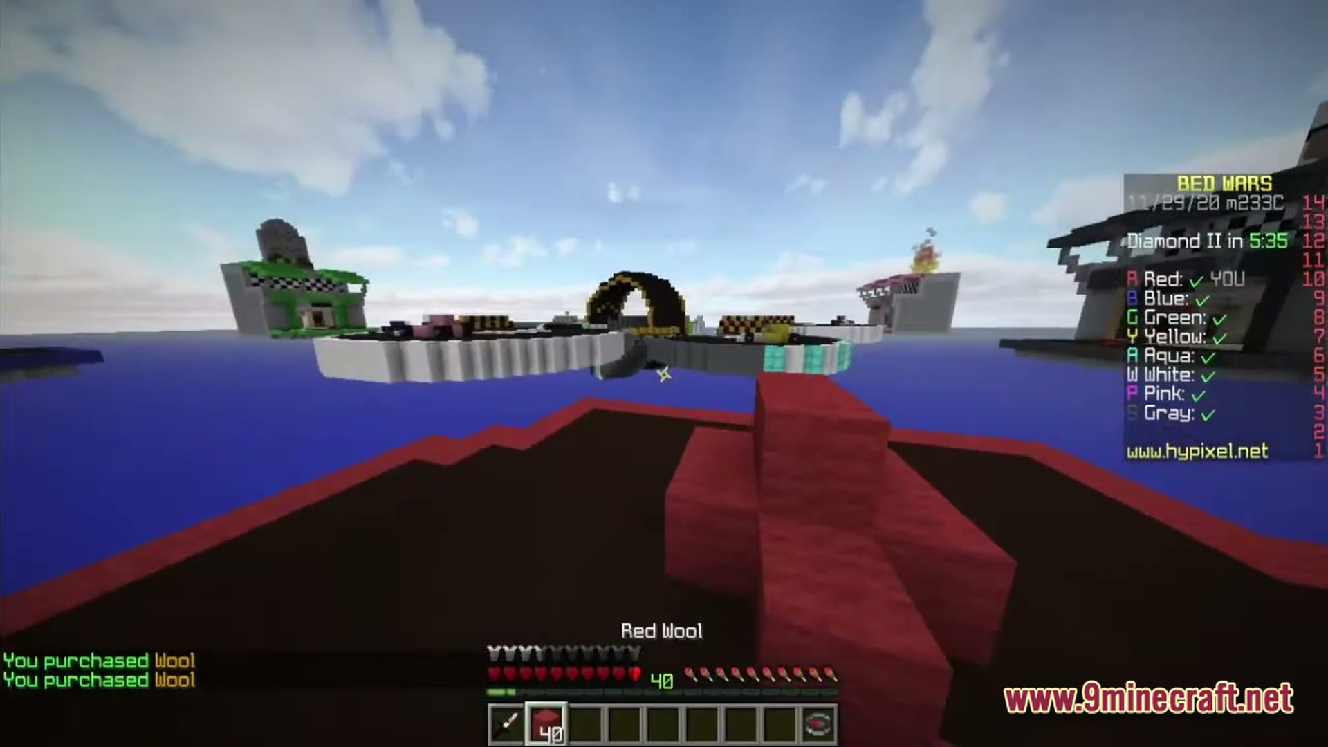 Eternal Return Chronicles Modpack Screenshot 2 A player holds red wool while looking at floating islands during a Bed Wars match