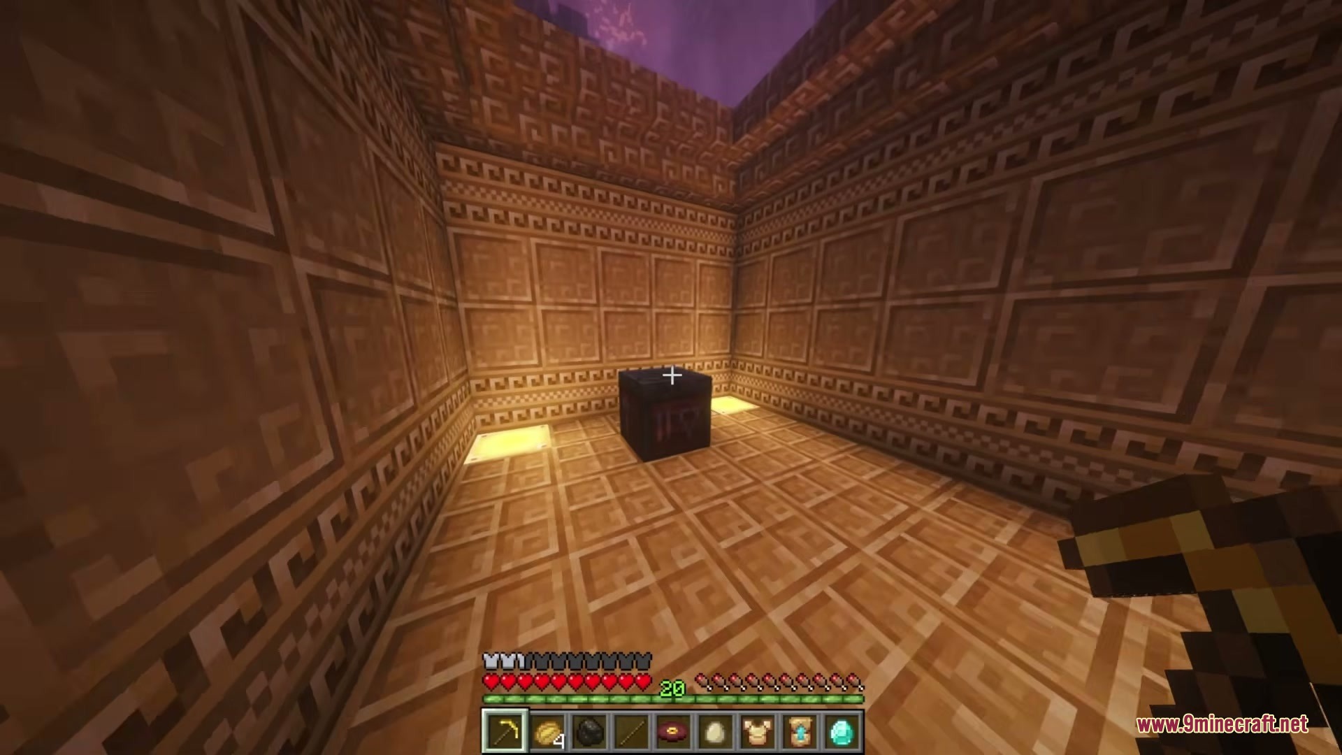 Even Better Nether Mod Screenshot 5 A player explores a room with patterned walls and a central dark block
