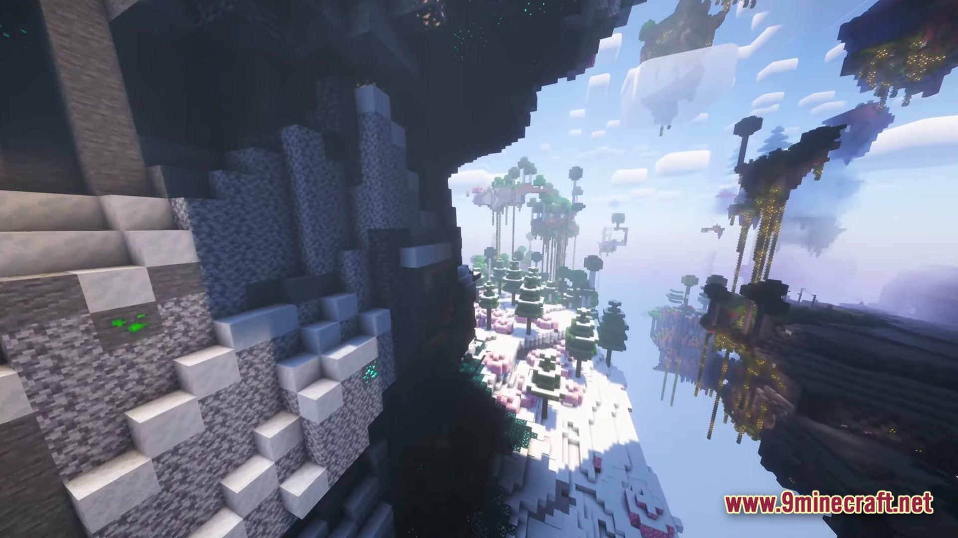 Exosphere 1 Modpack Screenshot 3 A snowy mountain cliff overlooks several floating islands with custom trees and glowing vegetation