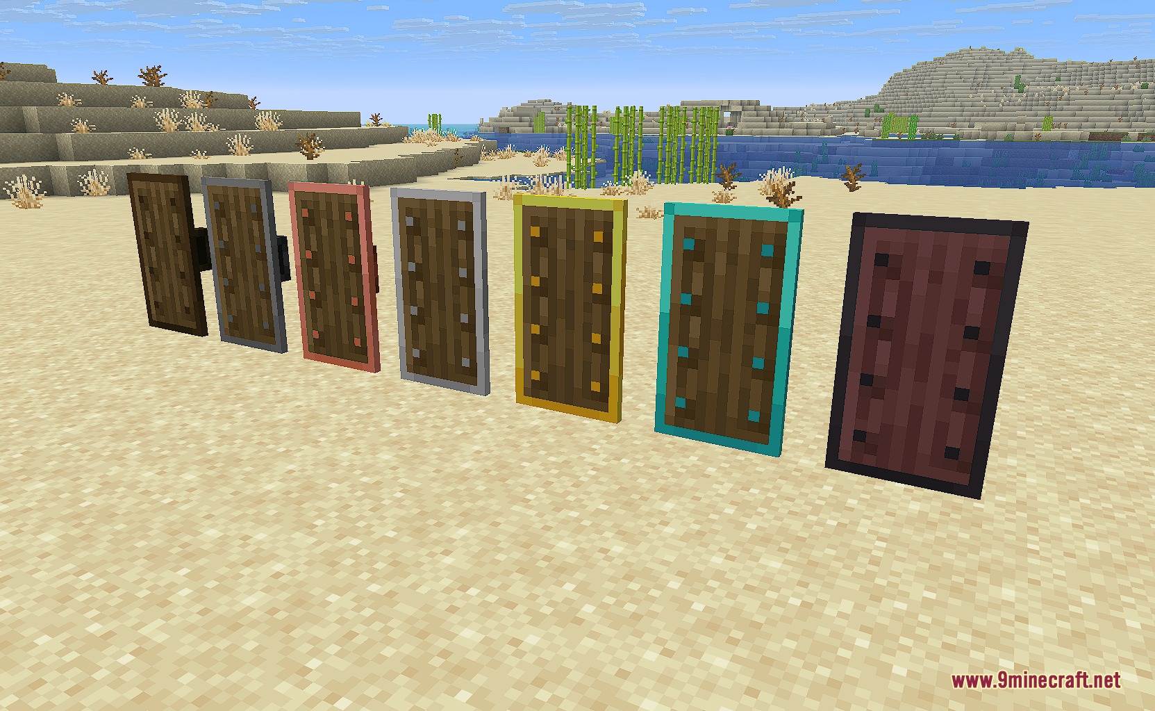 Expanded Weaponry Mod Screenshot 7 A collection of upgraded shields made from different materials on the sand