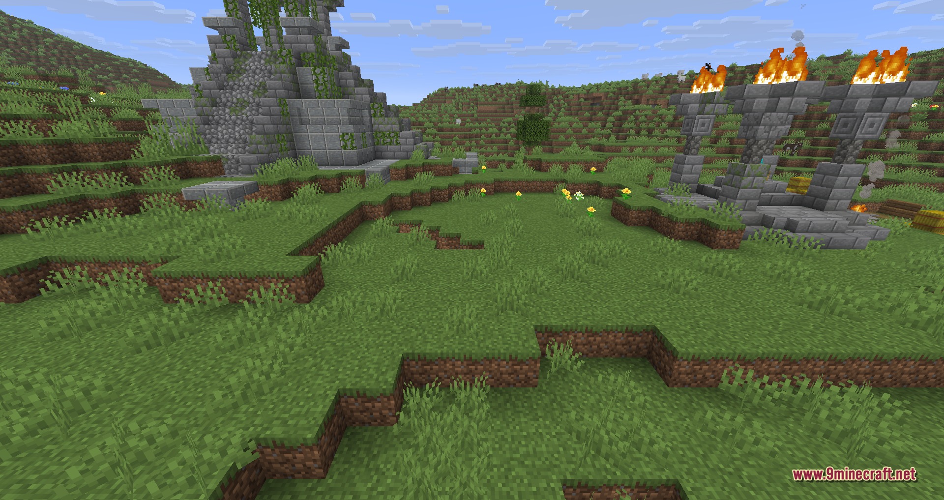 Explorations 9minecraft Mod Screenshot 2 A stone temple and a ritual altar with burning fires sit on a hill