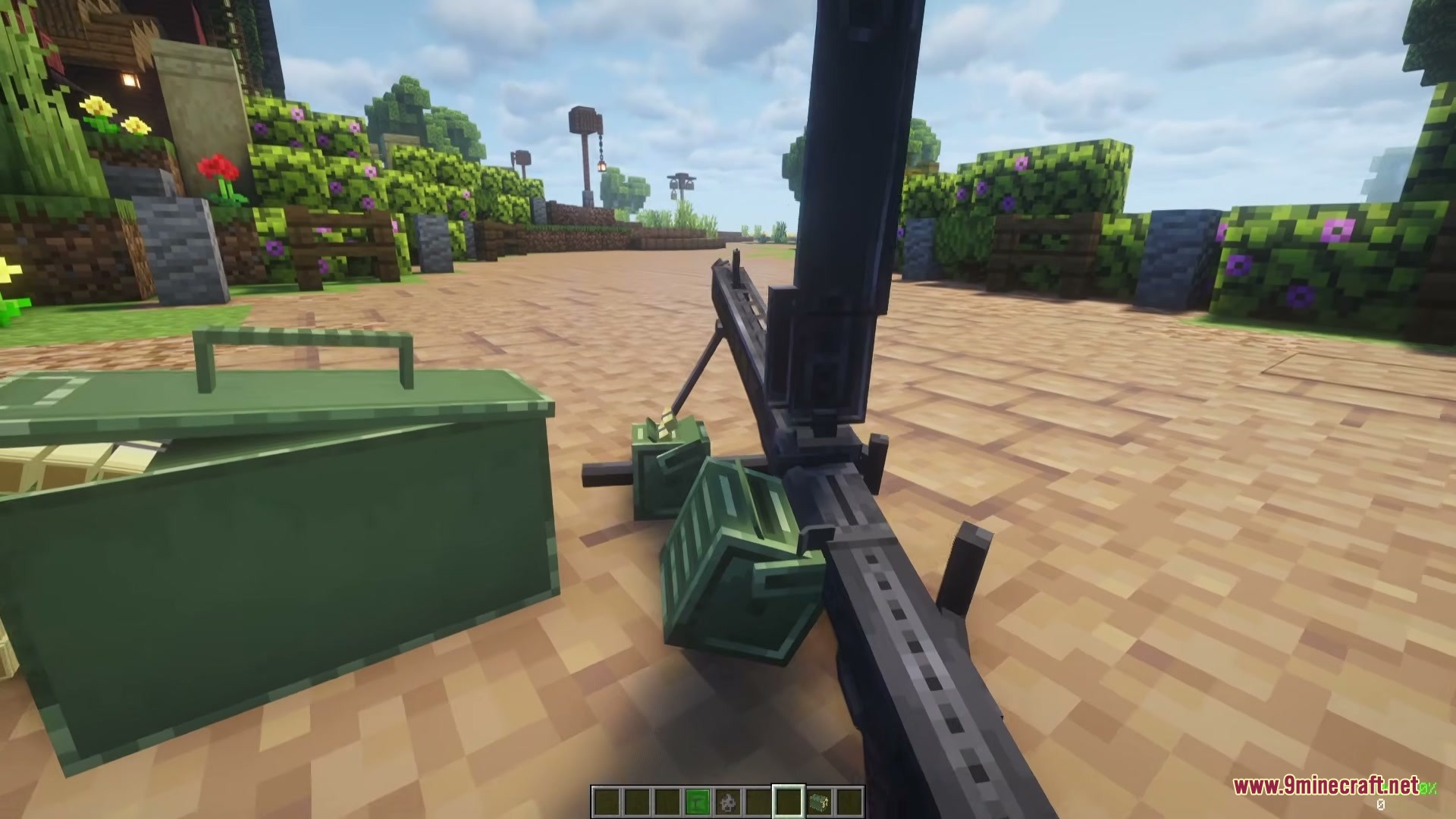 FMGII German Pack Mod Screenshot 4 The player reloads a heavy machine gun with the top cover flipped open