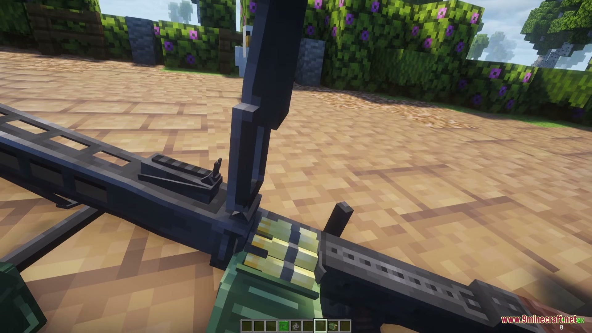 FMGII German Pack Mod Screenshot 6 Player reloads a German machine gun by inserting a belt of ammunition