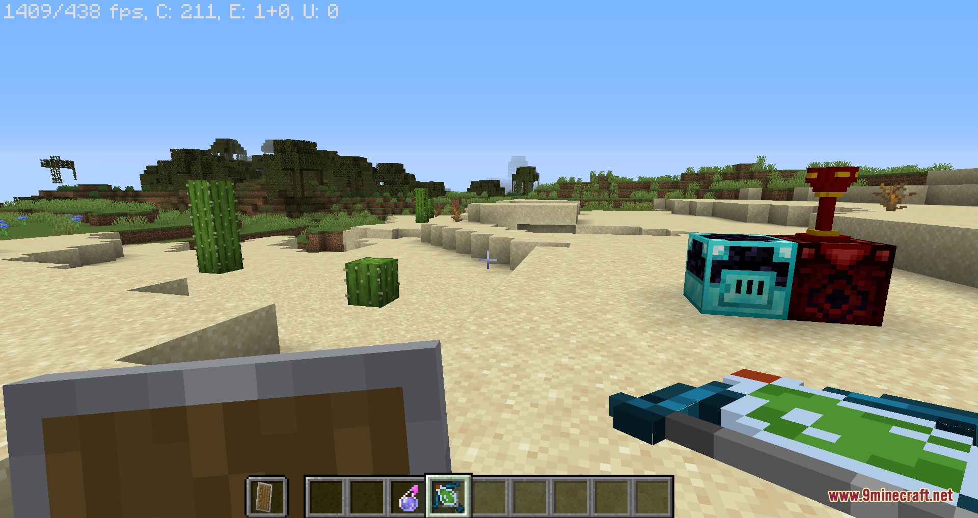 A player holds a magic scroll near custom blocks in the desert