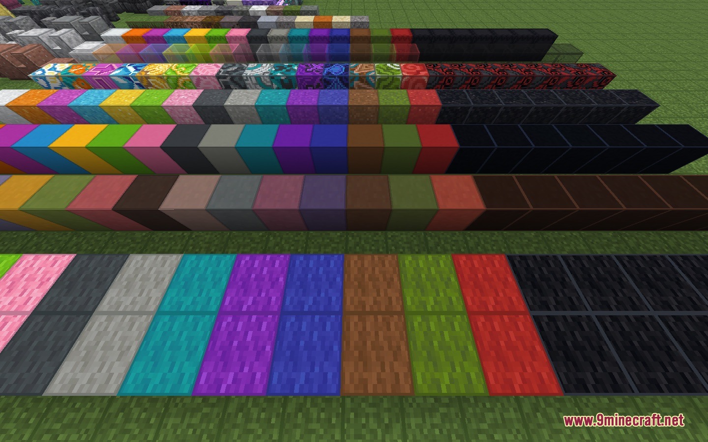 Facet Mod Screenshot 3 Rows of colorful building blocks arranged neatly on a flat green grass field