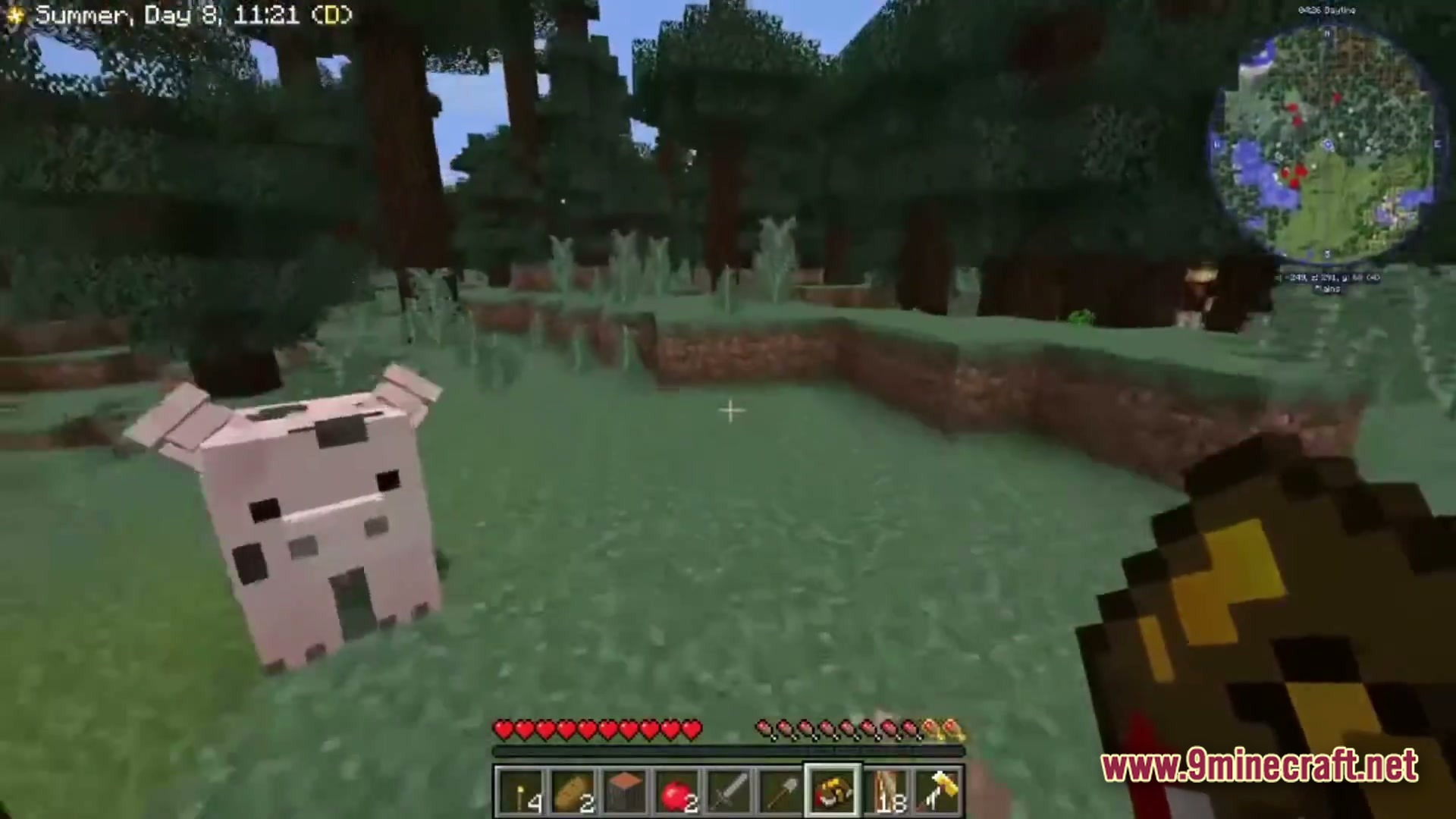 Farming Crossing 5 Made To Order Modpack Screenshot 3 A player holds a book near a spotted pig in a forest biome with HUD elements