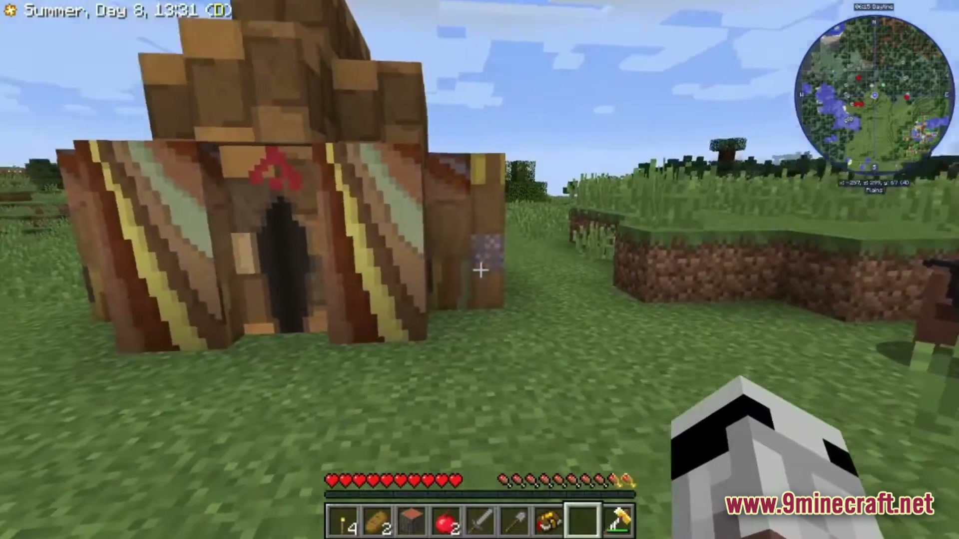 Farming Crossing 5 Made To Order Modpack Screenshot 5 A player stands in a plains biome near a decorative striped tent structure with a minimap