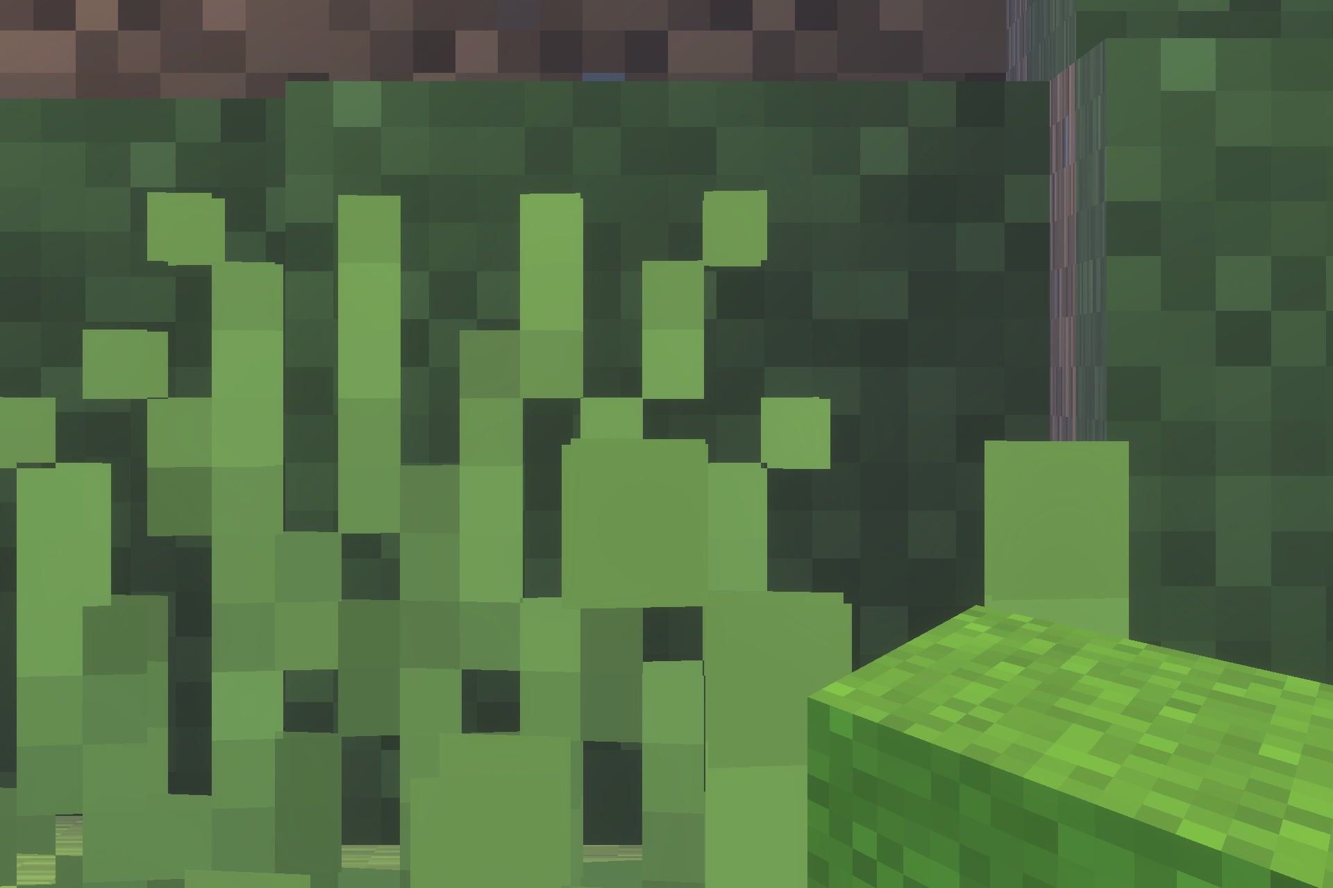 Close up view of grass blocks with full side textures in Minecraft