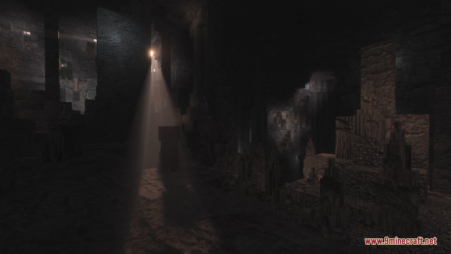 Feel True Resource Pack Screenshot 7 A dark cave featuring realistic textures and a dramatic beam of light