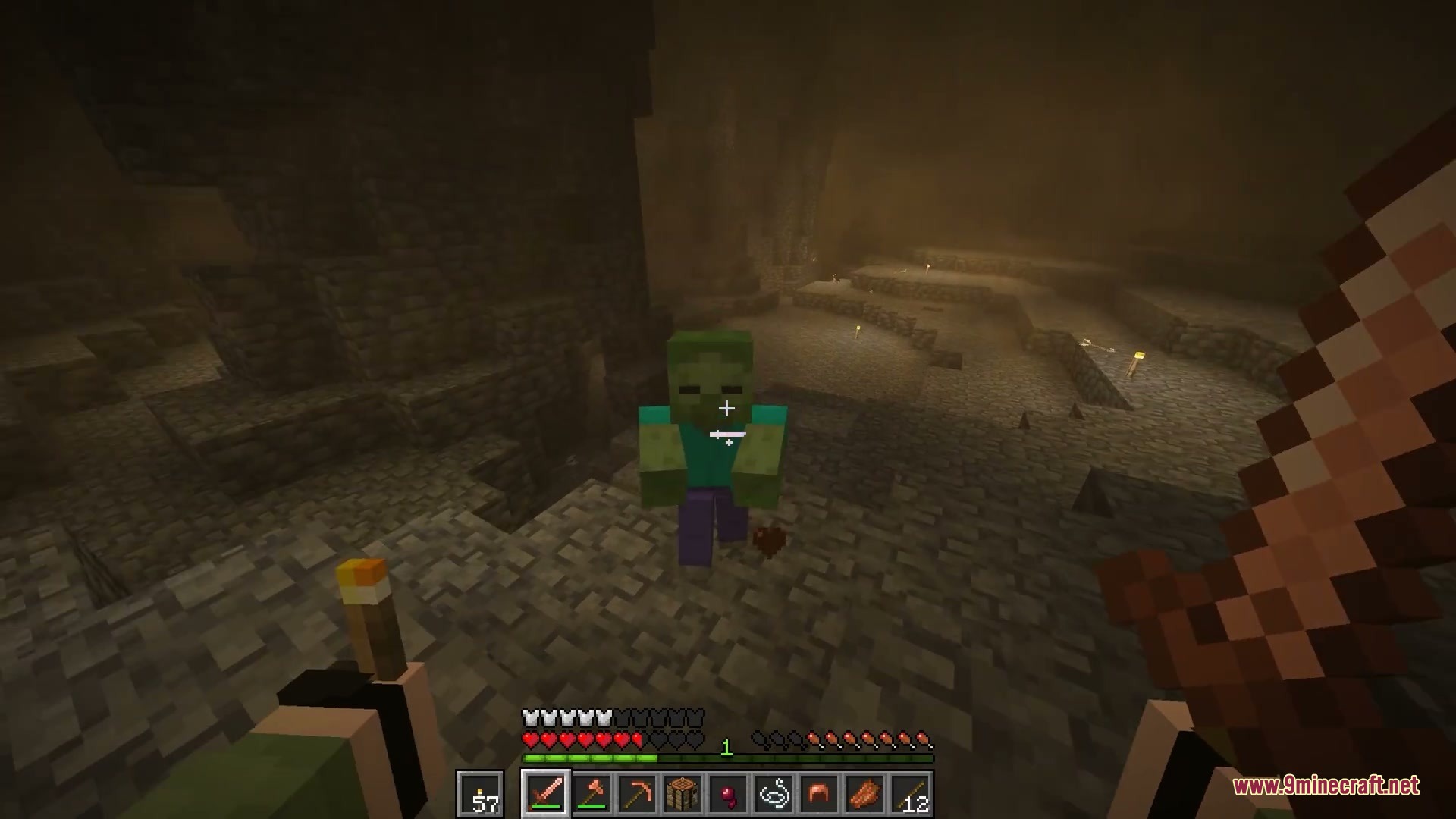 Final Moments Archive Mod Screenshot 5 Player holding a torch and sword facing a zombie in a dark cave
