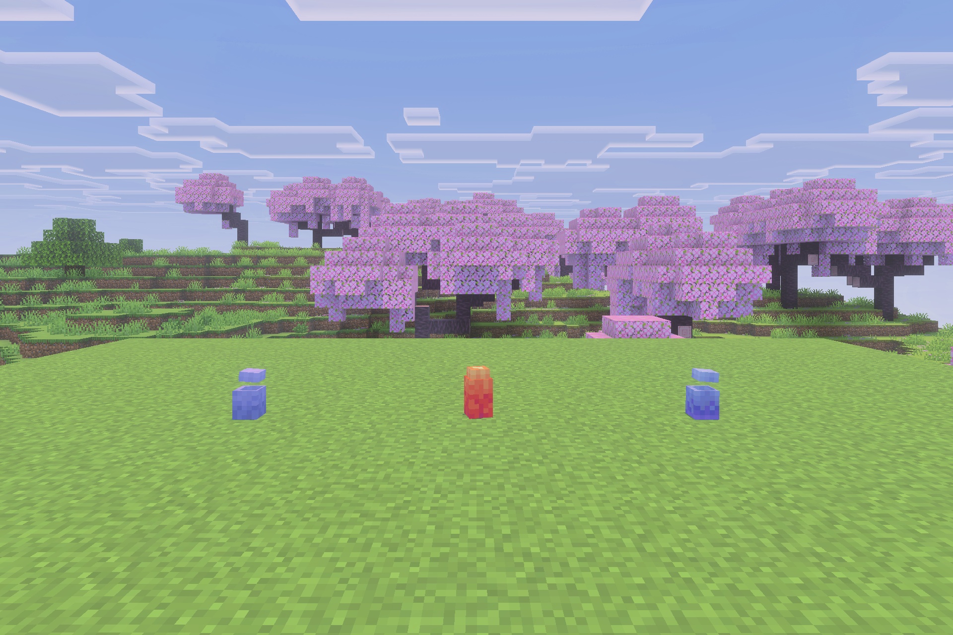 Fire and Steel Dragons Addon Screenshot 4 Three colorful dragon eggs from the Fire and Steel Dragons mod on grass