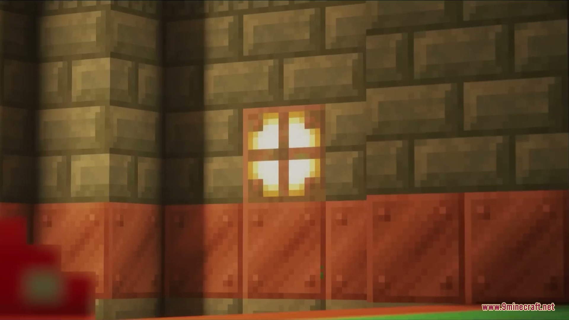 Glowing copper bulb block placed inside a wall made of stone bricks