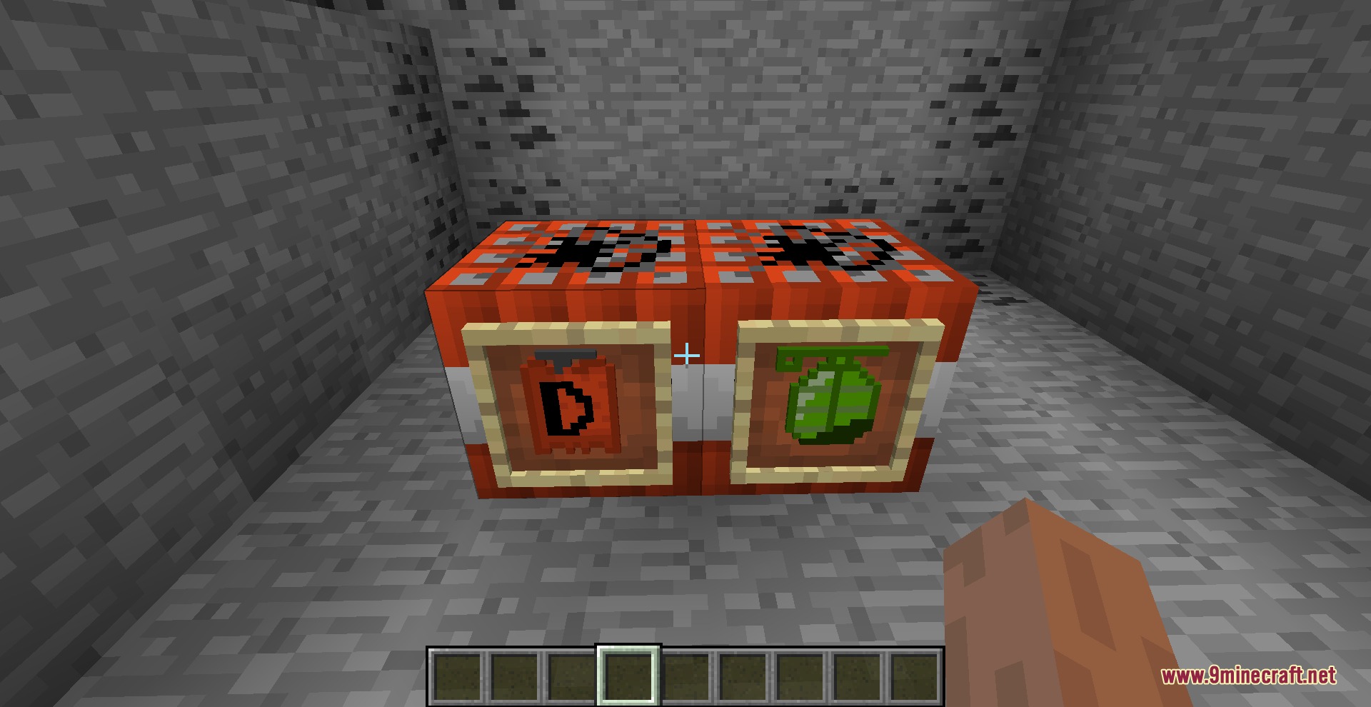 Dynamite and grenade items displayed in frames on TNT blocks inside a cave