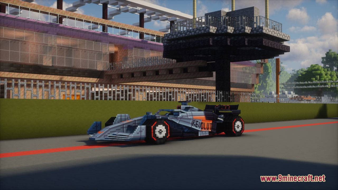Formula MC Mod Screenshot 4 A grey and orange Revolut Formula One car on a Minecraft track
