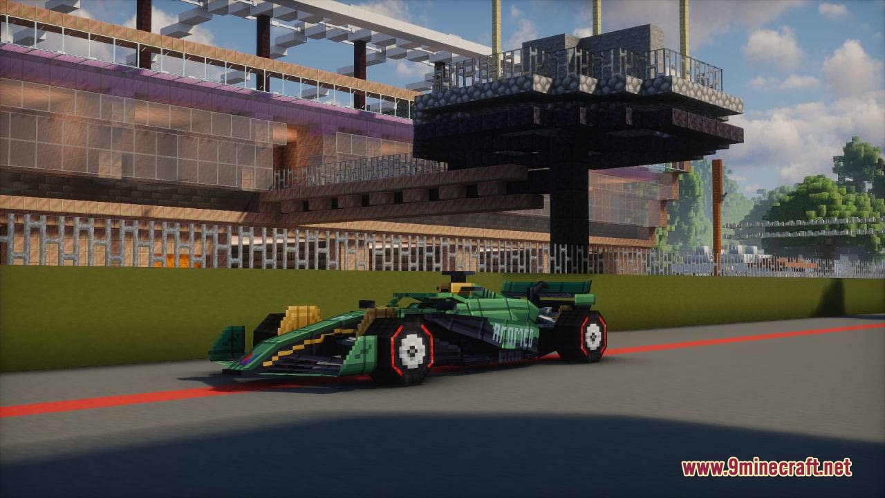 Formula MC Mod Screenshot 6 A green and black racing car parked on a custom Minecraft circuit