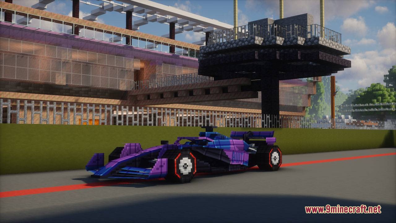 Formula MC Mod Screenshot 7 A purple and blue Formula racing car parked on a Minecraft track