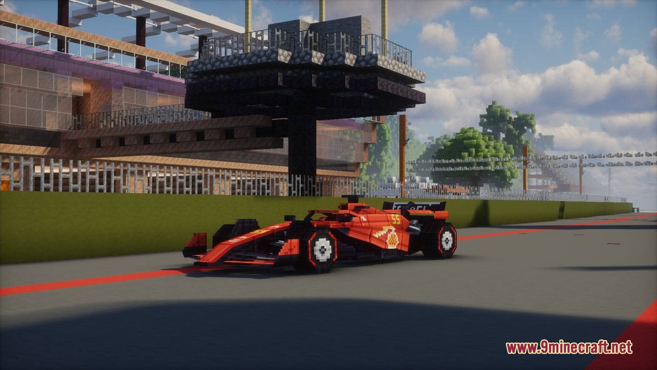 Formula MC Mod Screenshot 8 A red Formula racing car with yellow accents on a Minecraft track