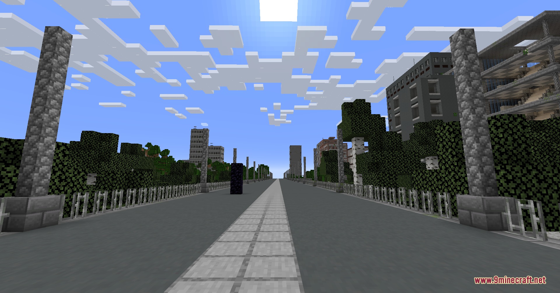 Forsaken Concrete Jungle Mod Screenshot 4 A wide concrete highway with stone pillars leading towards tall abandoned buildings