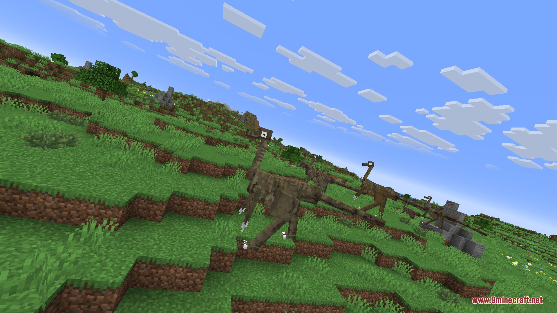Fossils&Archeology Origins Mod Screenshot 7 A herd of prehistoric dinosaurs roaming across a vast green grassy hill