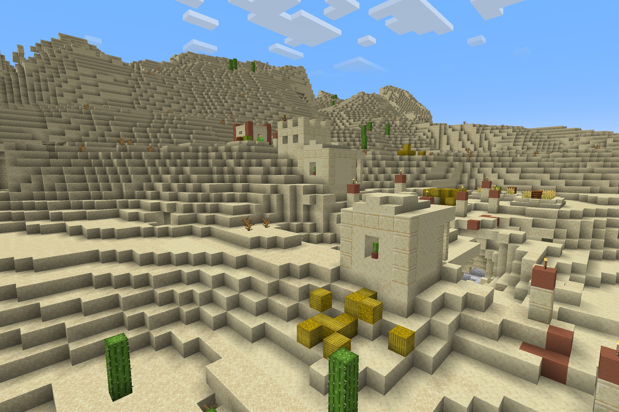 Fps Boost Pack by Verse Playz XD Resource Pack Screenshot 5 Sandstone buildings and hay bales in a desert village under a clear sky