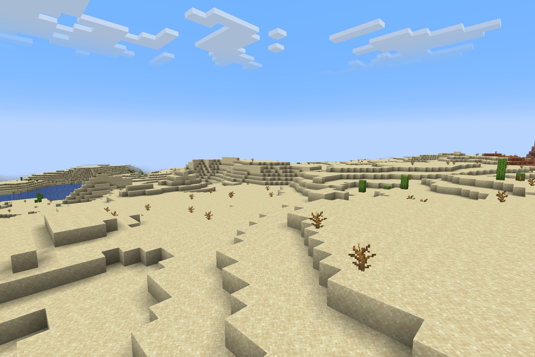 Fps Boost Pack by Verse Playz XD Resource Pack Screenshot 9 A wide desert landscape with sand dunes and dead bushes in Minecraft