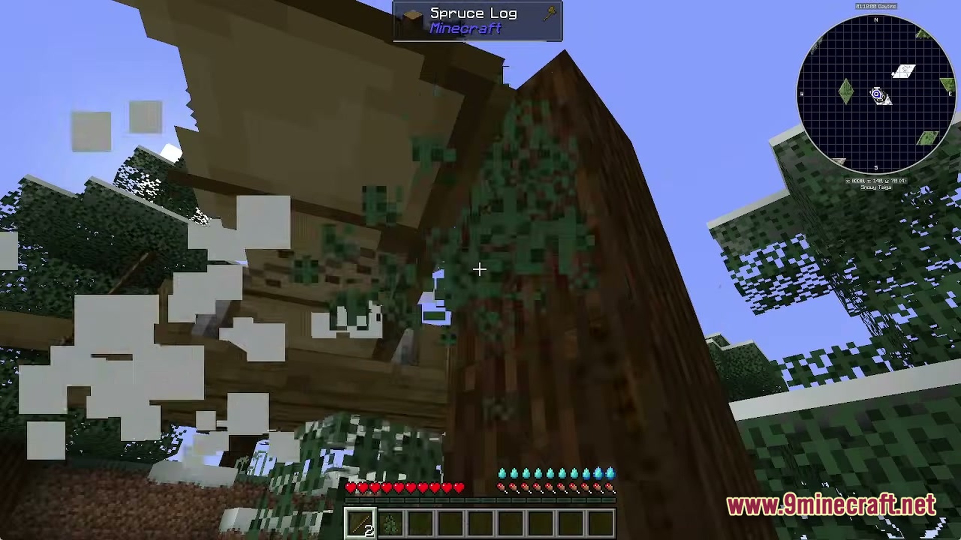 A player harvests a spruce log in a snowy taiga biome within the Fractured Opolis modpack