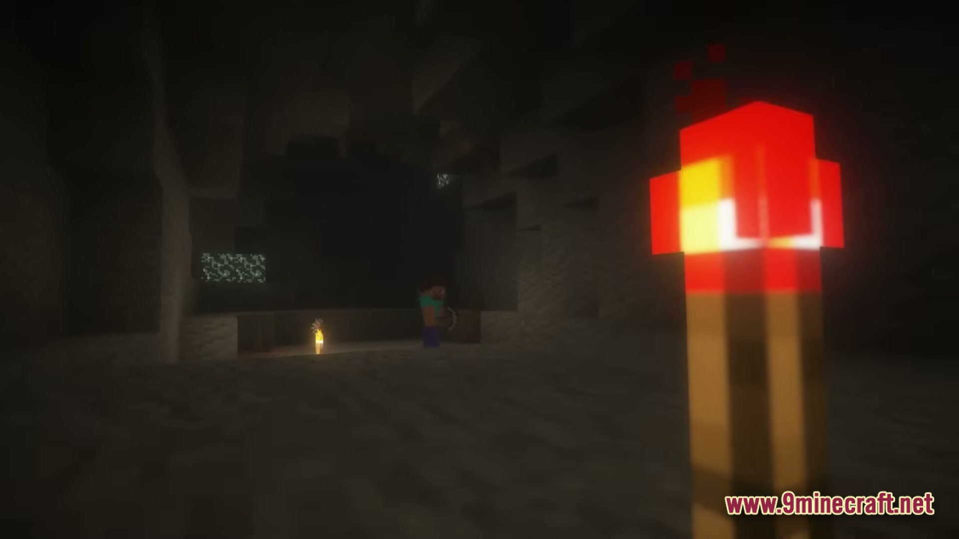 From The Fog Modpack Screenshot 5 A redstone torch illuminates a dark cave where Herobrine stands near a distant light source