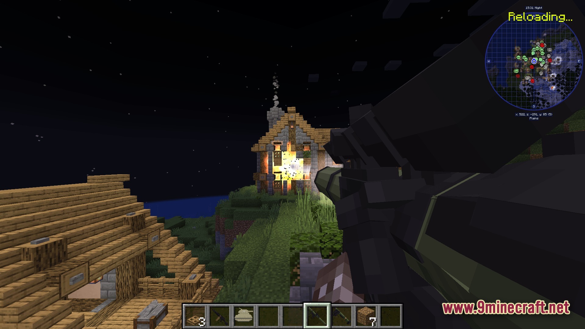 Frontier Combat Engine Modpack Screenshot 1 A player aims a rocket launcher at a wooden house exploding during the night in Minecraft