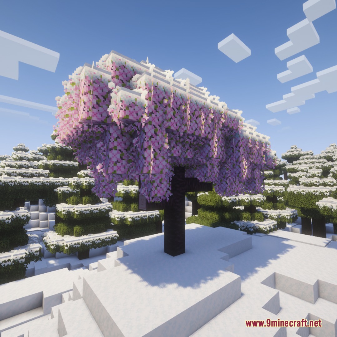Frost Glazed Canopies Mod Screenshot 6 Pink cherry blossom tree with hanging vines and snow in a snowy forest