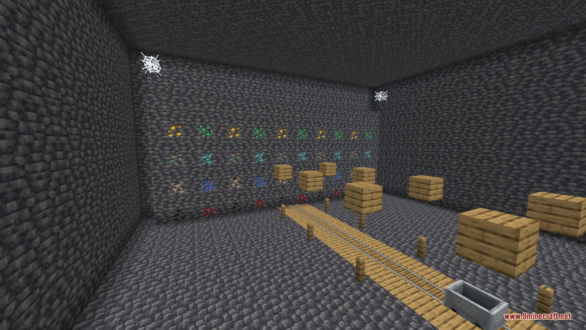 Fullbright UB 9minecraft Resource Pack Screenshot 2 A minecart sits on wooden tracks inside a stone room with bright lighting