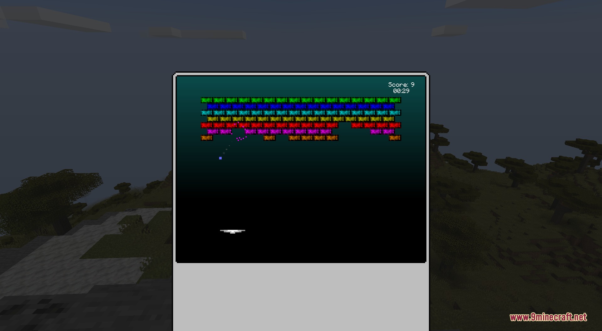 Gamer's Glee by DiamondWalker Mod Screenshot 3 A player playing the Block Break minigame on a handheld console in Minecraft