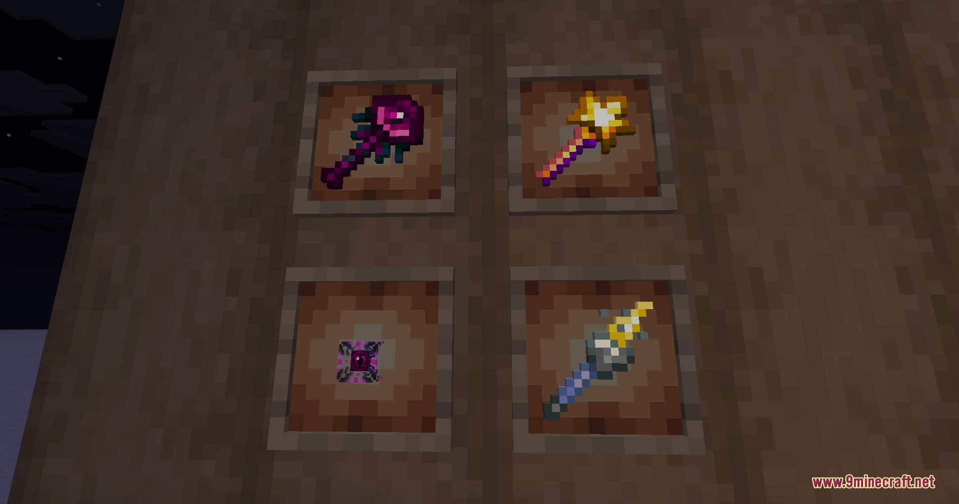 Geo Smelt Reforged Mod Screenshot 8 Magical staves and unique items showcased in item frames on a wooden wall