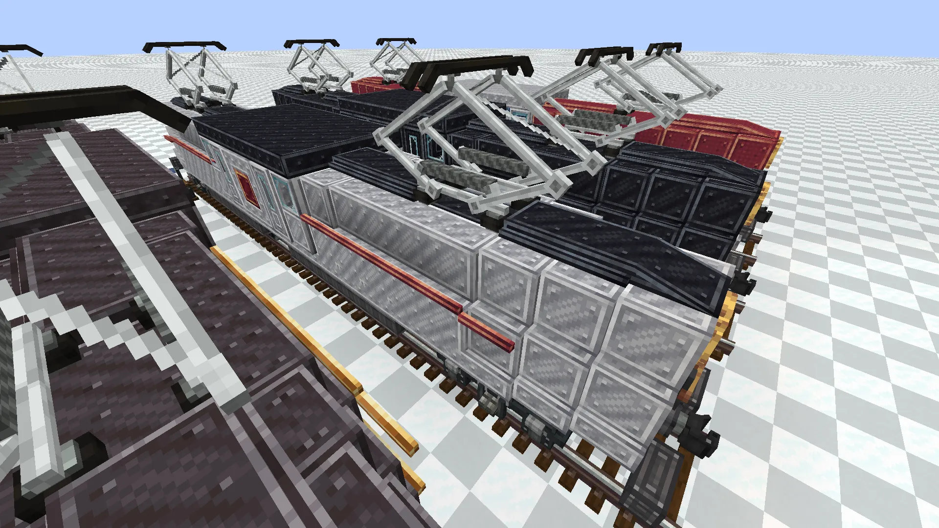 Gg1 Locomotive Schematic Screenshots 3 A silver GG1 locomotive with red accents parked on a railway track