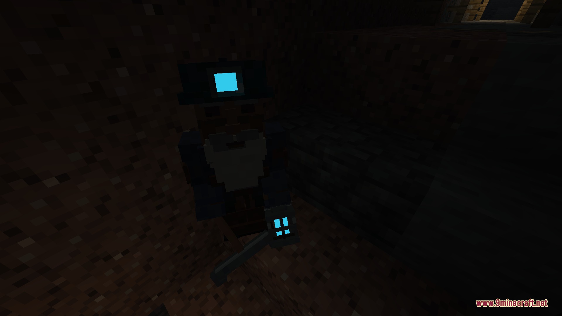 Ghostworks Mod Screenshot 1 A mysterious miner NPC holding a glowing blue lantern in a dark cave