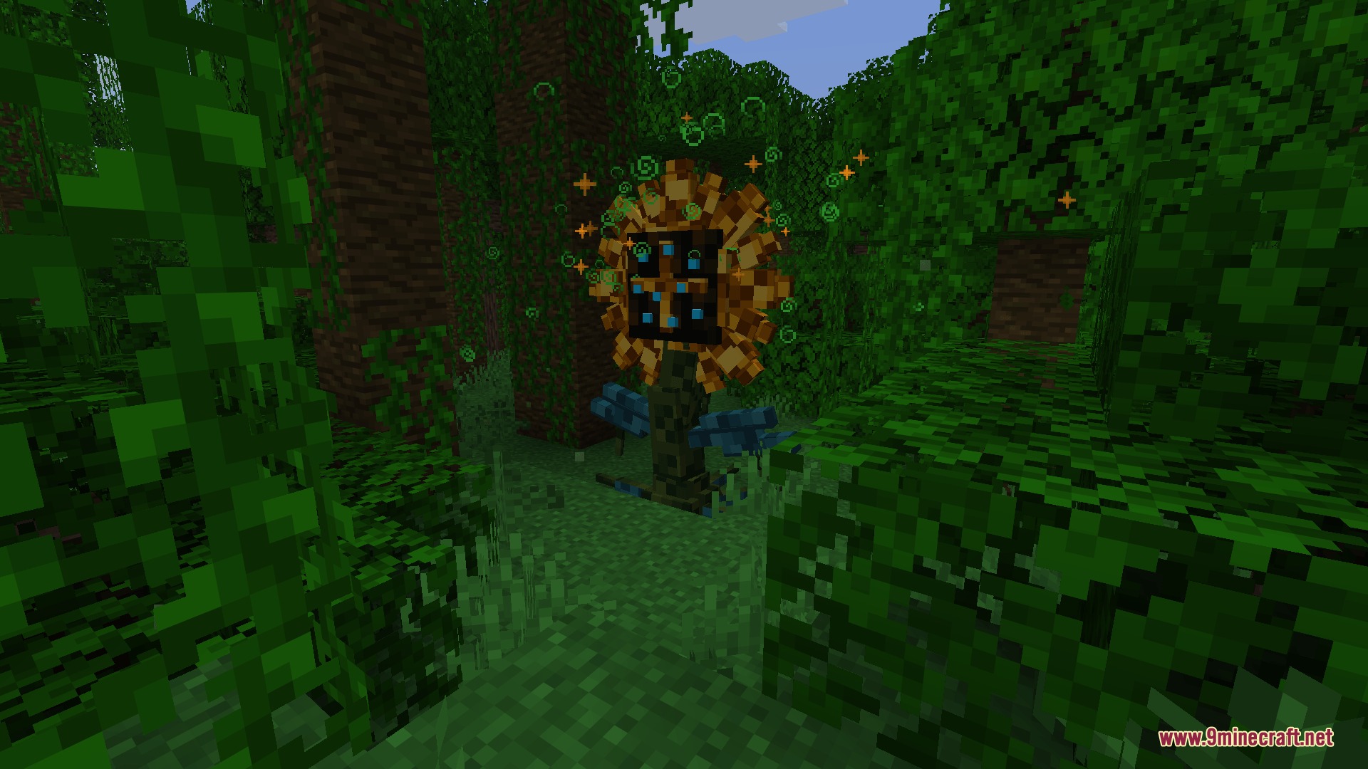 Ghostworks Mod Screenshot 8 Green and orange magic particles swirl around a large mechanical sunflower hive