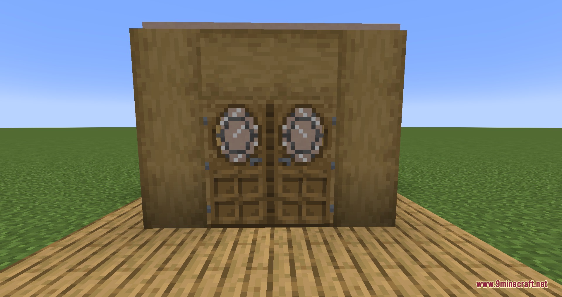 Gothiclily's Doors Resource Pack Screenshot 3 Two oak doors with circular glass windows installed in a wooden wall