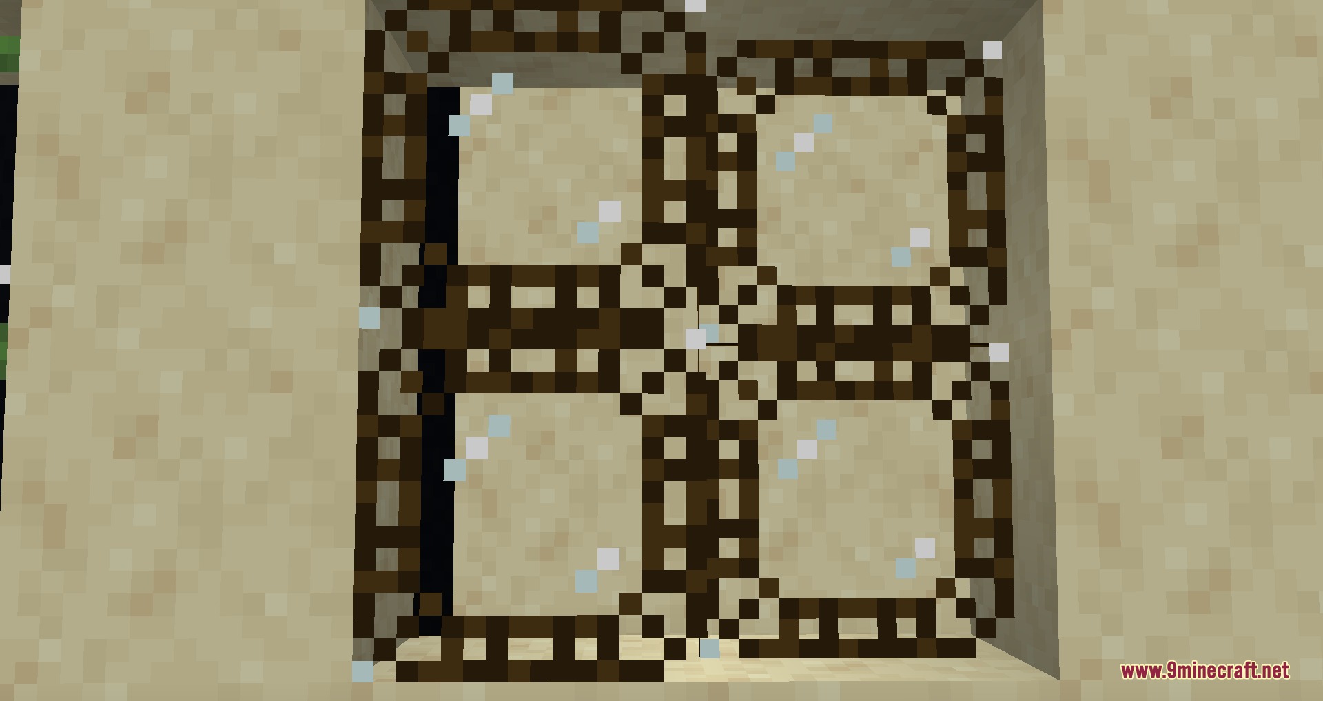 Gothiclily's Glass Pack Resource Pack Screenshot 7 Detailed dark patterned window frames with glass panes in a sandstone wall