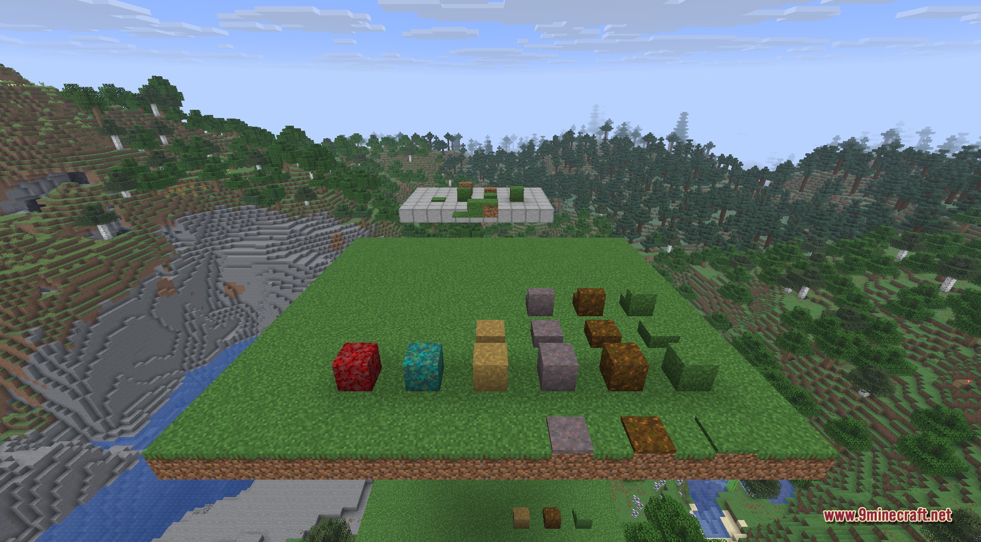 Showcasing different shapes and layers of decorative grass blocks on a platform