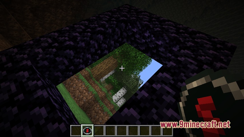 Gravity Changer Unofficial Port Mod Screenshot 5 Looking through an obsidian hole at a forest while holding a gravity tool