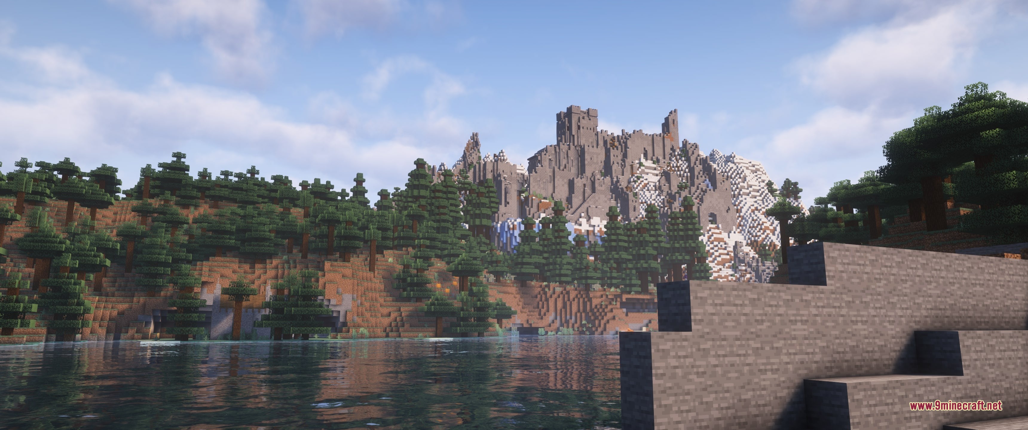 Grim Kingdoms Vanilla Edition Data Pack Screenshot 1 Large medieval stone fortress built into a mountain overlooking a calm lake