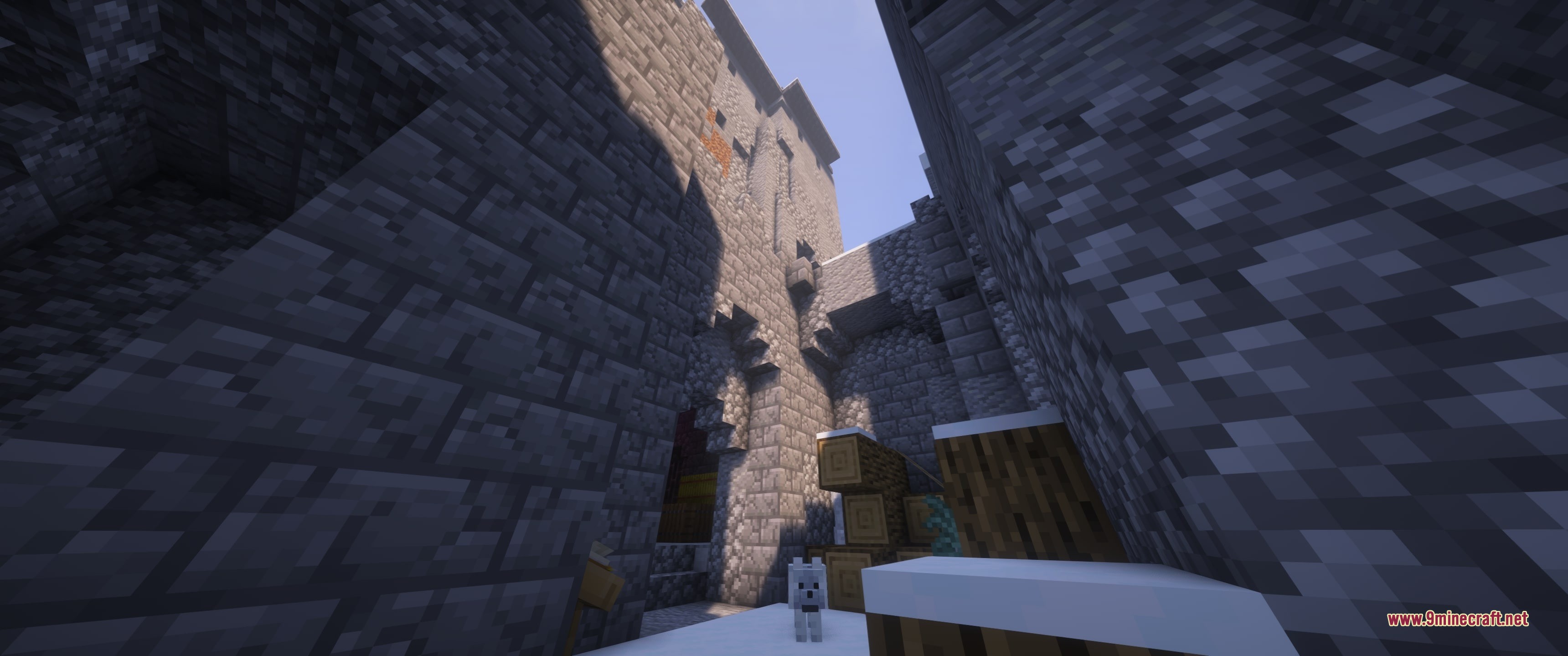Grim Kingdoms Vanilla Edition Data Pack Screenshot 3 A white wolf sits in a snowy courtyard of a stone castle