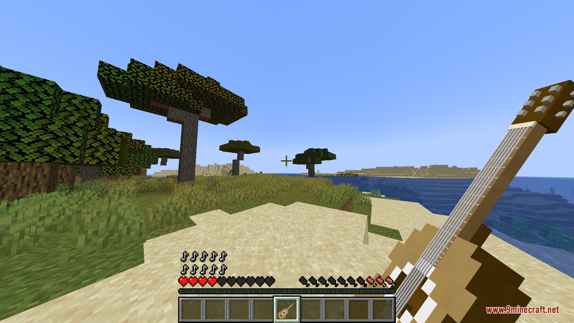 Guitars Mod Screenshot 1 A player holding an acoustic guitar in a savanna biome with musical notes