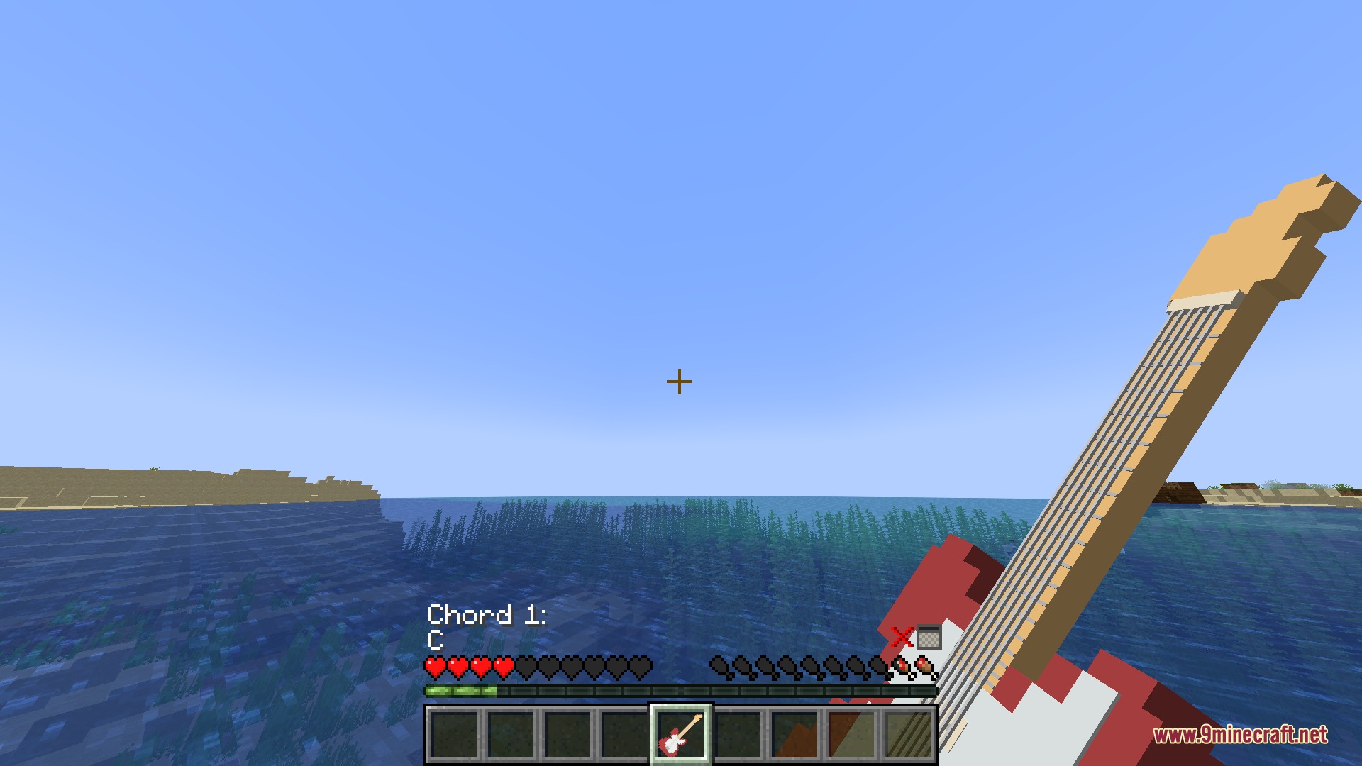 Guitars Mod Screenshot 2 Player holding a red electric guitar over the ocean with chord selection text