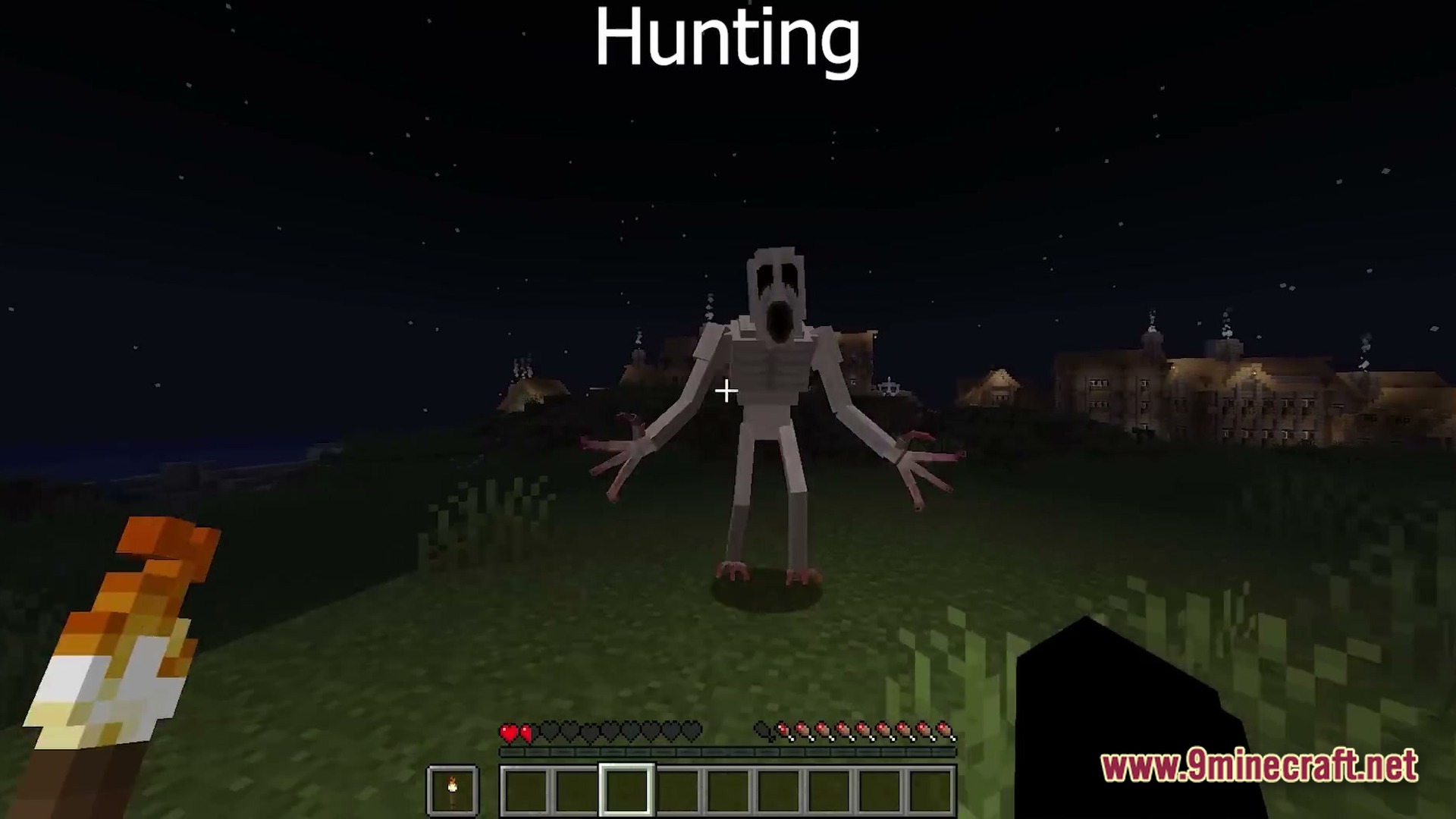 HORROR Modpack Screenshot 1 A tall, pale humanoid creature with elongated limbs stands in a grassy field at night