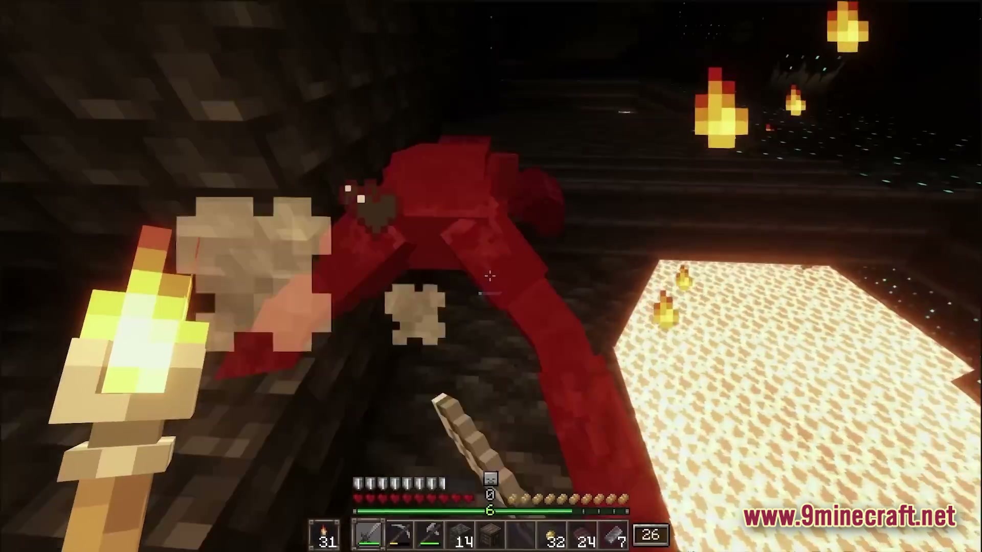 HORROR Modpack Screenshot 2 A player holding a torch encounters a large red creature in a dark underground cave