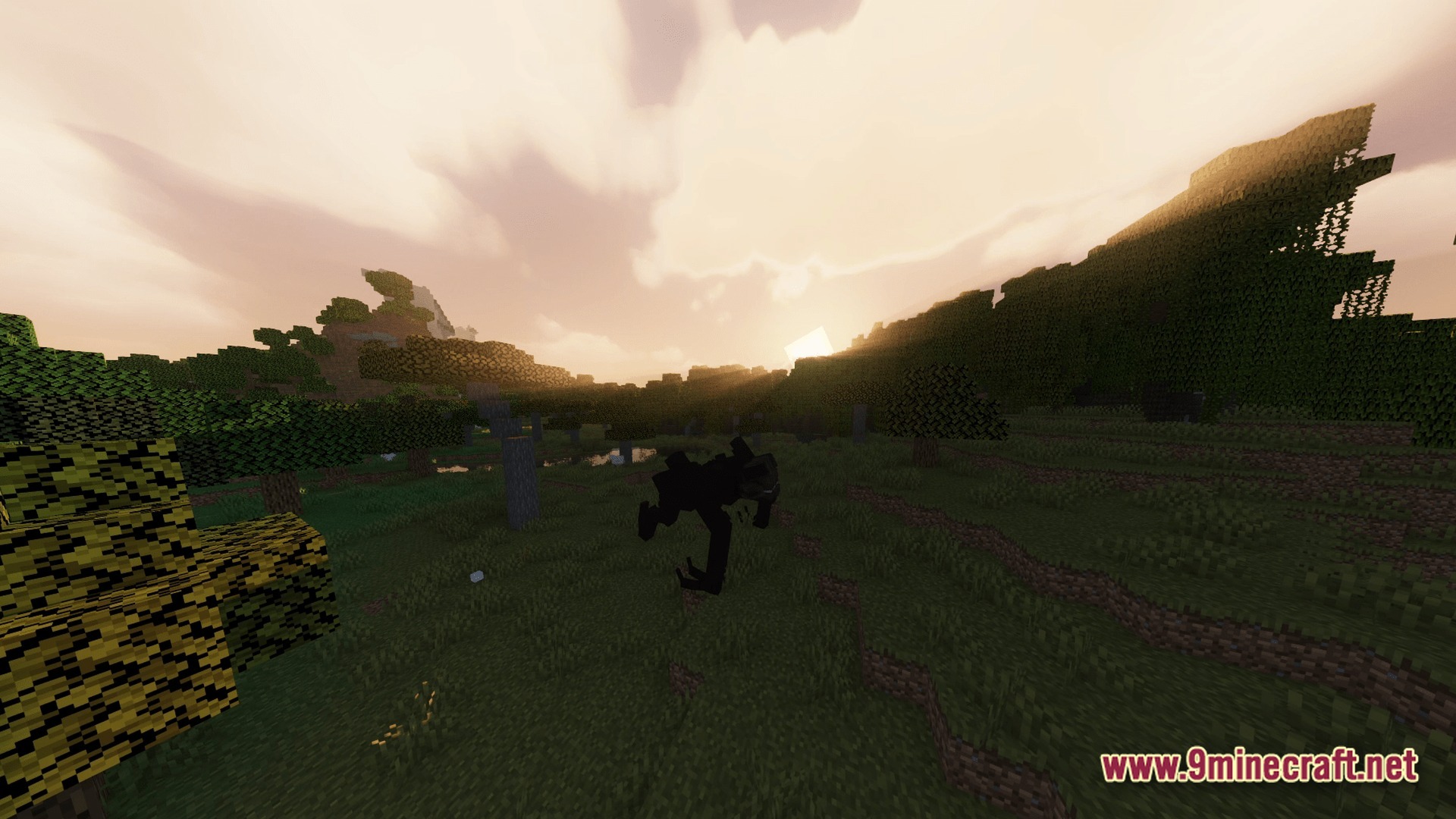 HORROR Modpack Screenshot 7 A dark, shadowy creature stands in a grassy field during sunset in a forested Minecraft biome