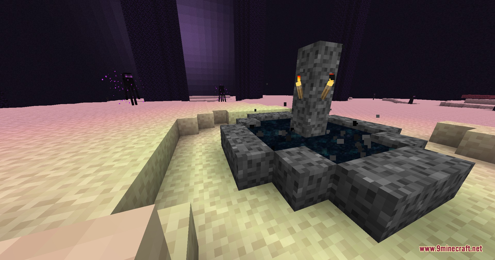 Small bedrock End portal with torches in the dark End dimension