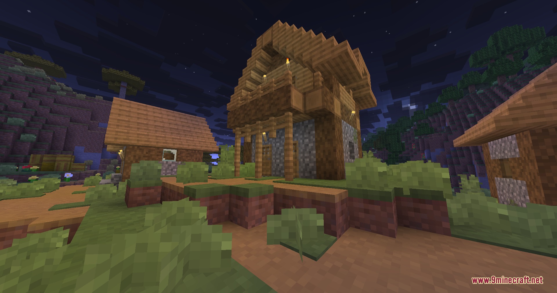 Wooden village houses at night showing the Half Sized Resource Pack effect