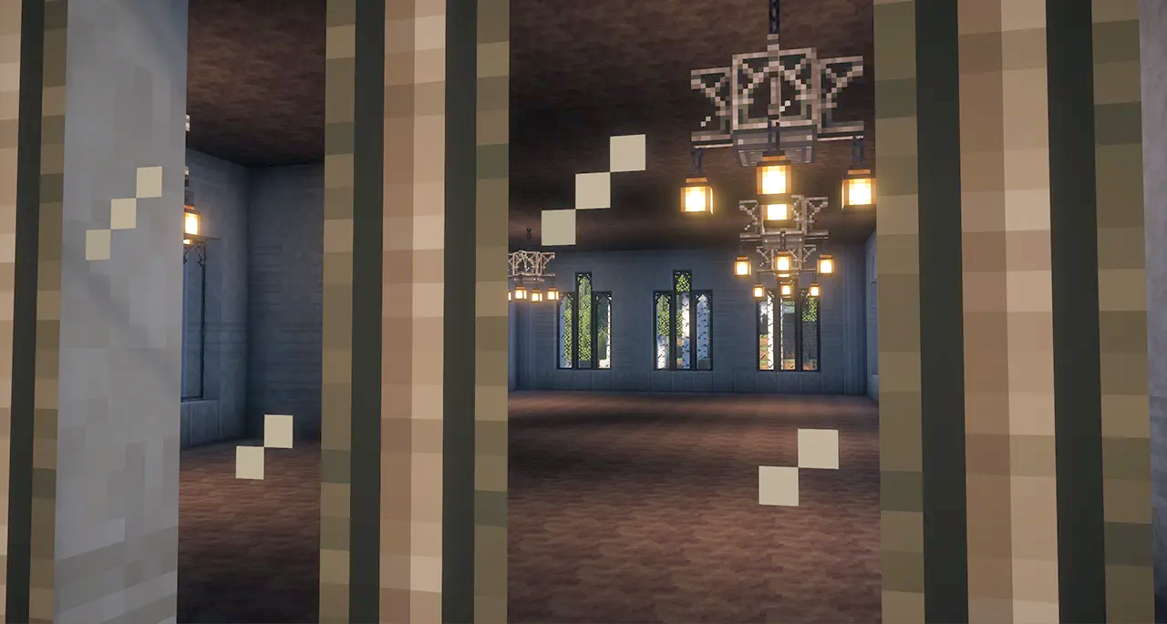 Interior view of a spacious hall building with decorative chandeliers and large windows